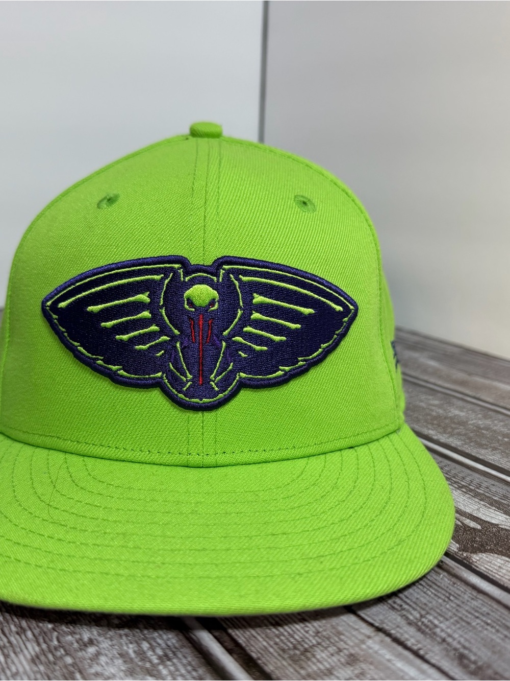 New Era Neon Lime Snapback Hat with Dark Wing Patch New Orleans pelicans